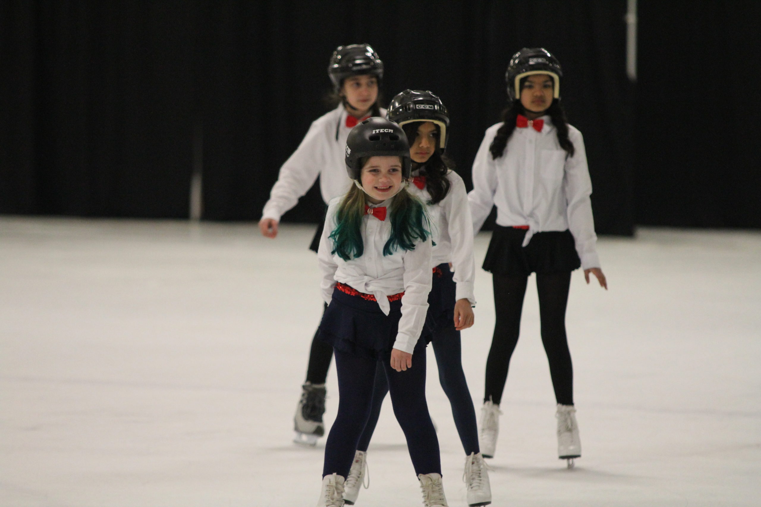 Figure Skaters with Helmets